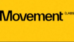 La imagen muestra un fondo de color amarillo brillante con la palabra "Movement" escrita en negro en un tipo de letra negrita y moderna. A la derecha de la palabra "Movement" y en un tamaño más pequeño, aparece "(LABS)" en negro, sugiriendo que el texto completo podría ser "Movement Labs". El diseño es simple y de alto contraste, con un estilo minimalista que resalta el texto sobre el fondo amarillo.
